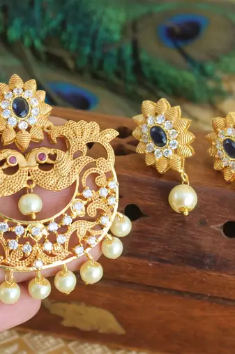 Designer matte finish cz peacock pendant set