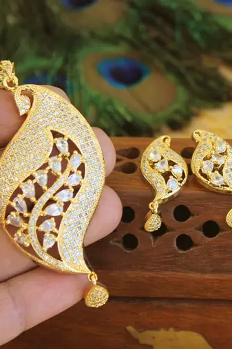 Designer gold plated cz peacock pendants set