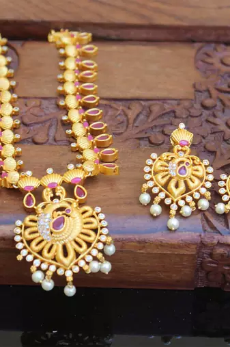 Designer matte finish ruby peacock pendant long necklace set