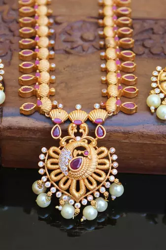 Designer matte finish ruby peacock pendant long necklace set