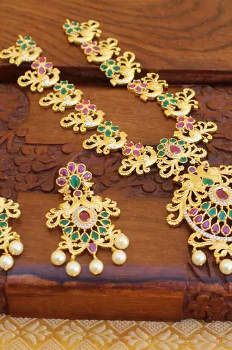 Designer gold plated cz peacock necklace set