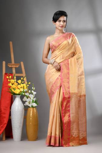 Peach floral motifs tissue silk saree with zari borders