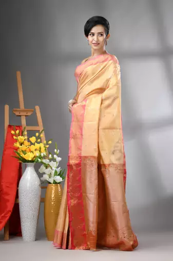 Peach floral motifs tissue silk saree with zari borders