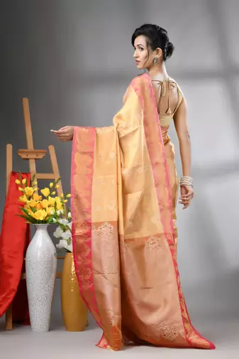 Peach floral motifs tissue silk saree with zari borders