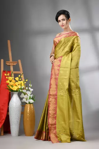 Sap green floral motifs tissue silk saree with zari borders