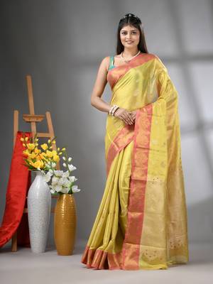 Yellow floral motifs tissue silk saree with zari borders 1