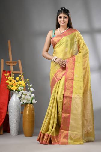 Yellow floral motifs tissue silk saree with zari borders