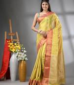 Yellow floral motifs tissue silk saree with zari borders