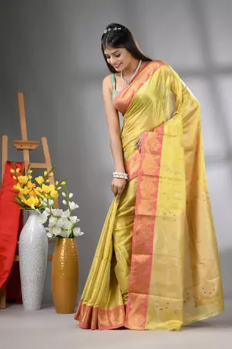 Yellow floral motifs tissue silk saree with zari borders