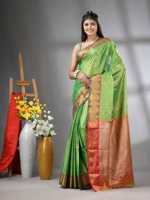Green floral motifs tissue silk saree with zari borders 1