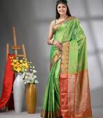 Green floral motifs tissue silk saree with zari borders