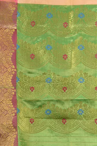 Peach texture motifs tissue silk saree with zari borders