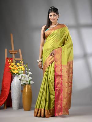 Light green texture motifs tissue silk saree with zari borders 1