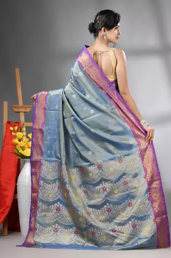 Blue texture motifs tissue silk saree with zari borders