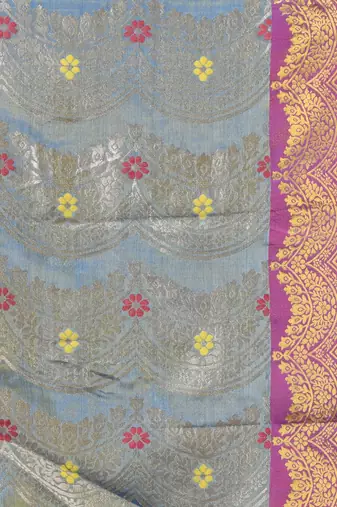 Blue texture motifs tissue silk saree with zari borders