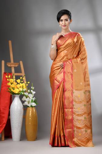 Orange texture motifs tissue silk saree with zari borders