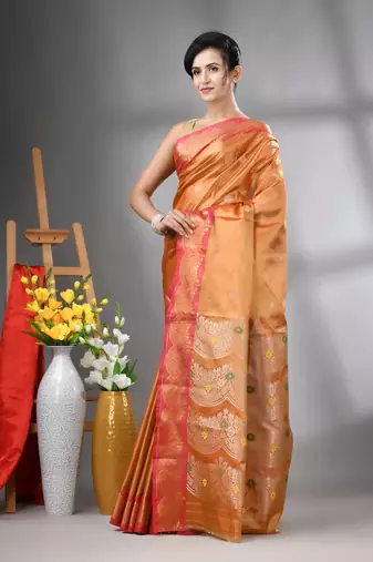 Orange texture motifs tissue silk saree with zari borders