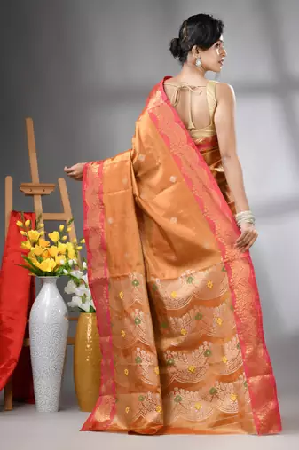 Orange texture motifs tissue silk saree with zari borders