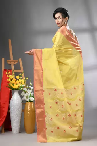 Yellow texture motifs tissue silk saree with zari borders