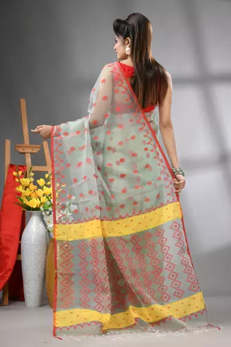 Pistachio green muslin soft saree with jamdani designs