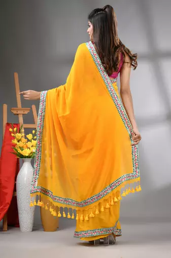 Yellow mul cotton soft saree with embroidered borders