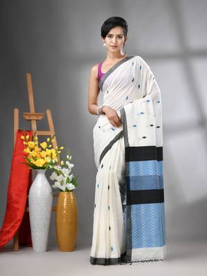 Off white cotton handwoven saree with texture designs 1