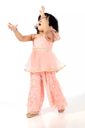 Elaisha girls  net embroidered peplum top & ruffled detailed sharara pants set- peach