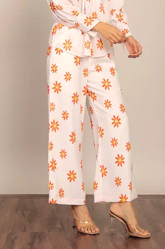 White and orange floral print relaxed pant