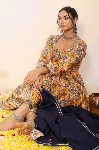 Yellow and multicolour floral printed anarkali suit set paired with pant and black dupatta