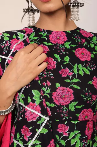Multicolour floral printed anarkali suit set paired with pant and pink dupatta