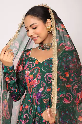 Green and pink floral printed anarkali suit set paired with pant and dupatta
