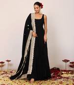 Black solid anarkali kurta set paired with dupatta having gota work at border