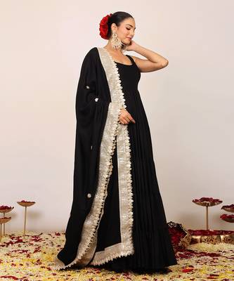 Black solid anarkali kurta set paired with dupatta having gota work at border 3