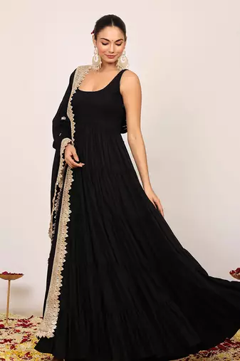 Black solid anarkali kurta set paired with dupatta having gota work at border
