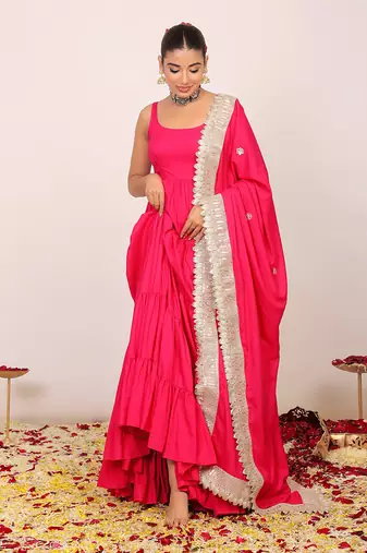 Pink solid anarkali kurta set paired with dupatta having gota work at border