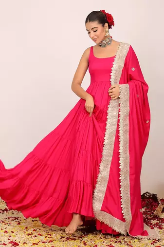 Pink solid anarkali kurta set paired with dupatta having gota work at border