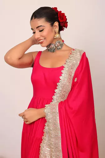 Pink solid anarkali kurta set paired with dupatta having gota work at border