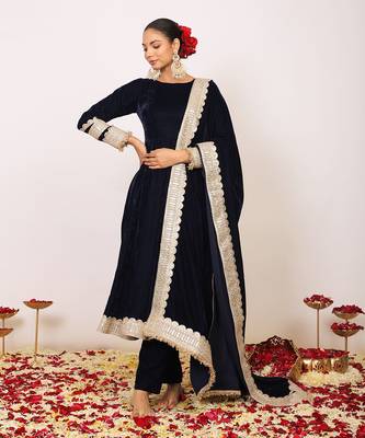 Solid black velvet anarkali kurta paired with pant and dupatta 1