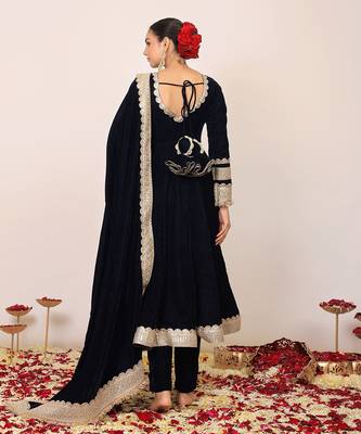 Solid black velvet anarkali kurta paired with pant and dupatta 6