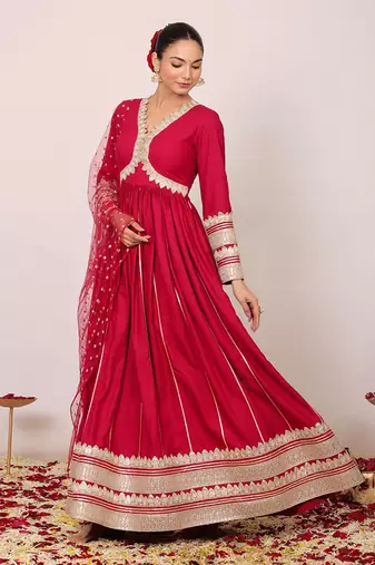 Pink solid anarkali kurta set with gota work at bottom paired with dupatta