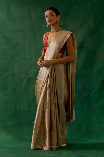 handcrafted beige gold zari silk saree with red chanderi blouse