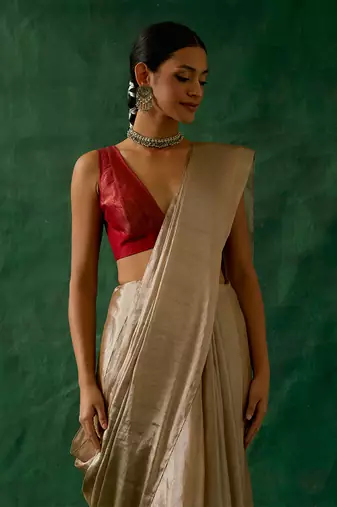 handcrafted beige gold zari silk saree with red chanderi blouse