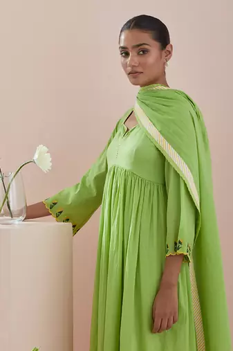 Anarkali kurta, crop pants with lace inserts, and green cotton dupatta