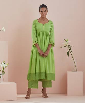 Anarkali kurta and crop pants with lace inserts in green cotton 1