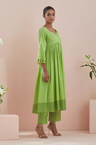 Anarkali kurta and crop pants with lace inserts in green cotton
