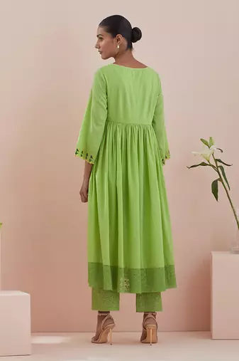 Anarkali kurta and crop pants with lace inserts in green cotton