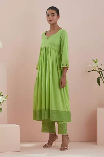 Anarkali kurta and crop pants with lace inserts in green cotton