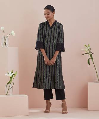 A line kurta in textured cotton with solid black pants 1