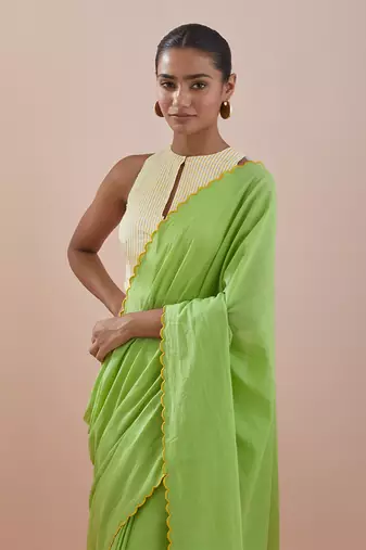 Green and off white co-ordinate set- green cotton saree with green embroidery and pinstripe blouse