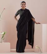 Black chanderi saree with textured cotton blouse in black